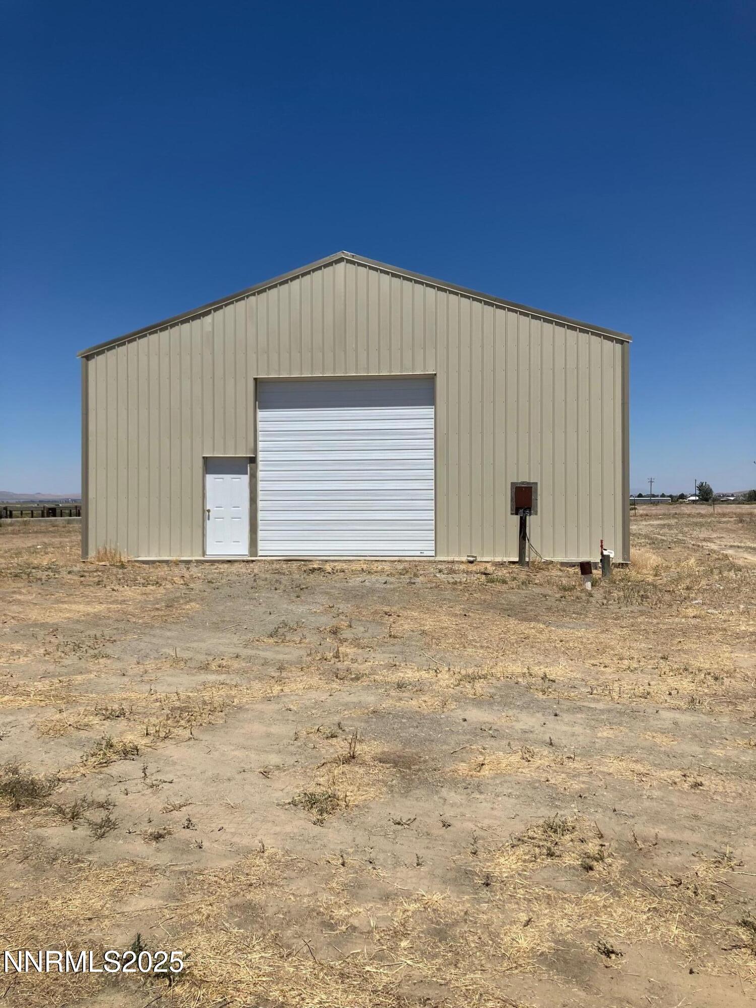 1200 Van Diest Road Winnemucca, NV 89445 - Photo 2 of 28 a view of wooden wall