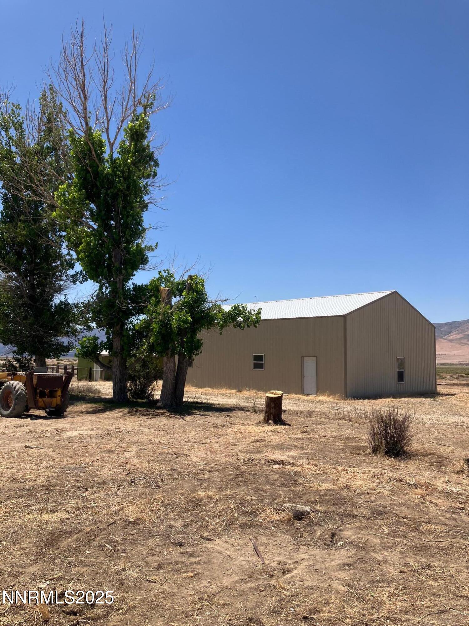 1200 Van Diest Road Winnemucca, NV 89445 - Photo 3 of 28 a view of a outdoor space with trees