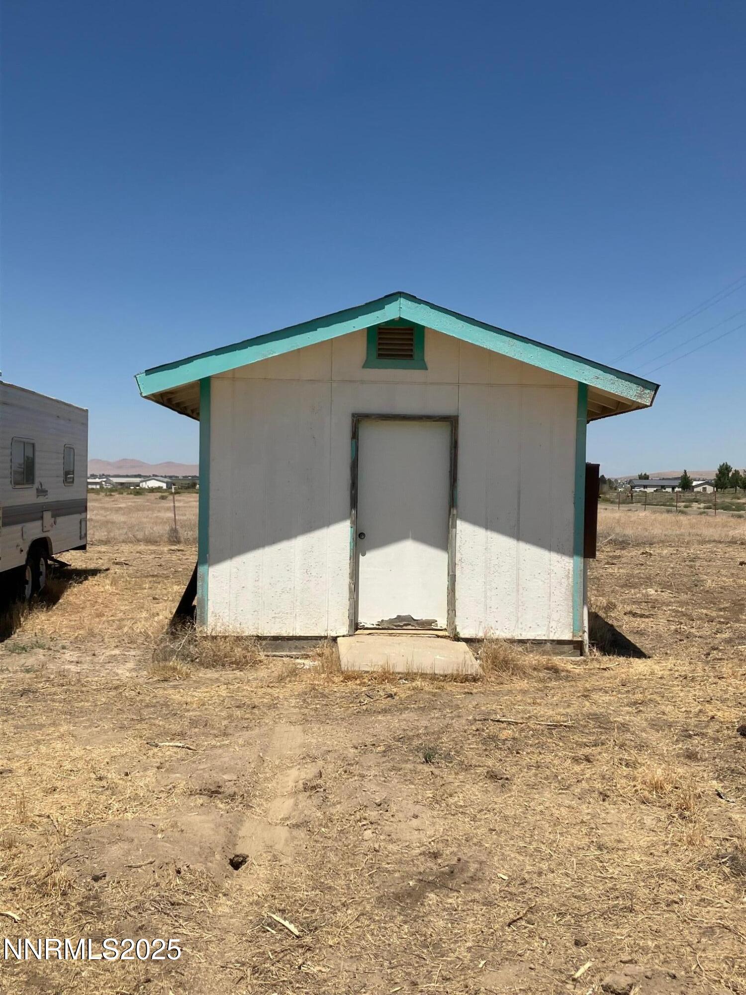 1200 Van Diest Road Winnemucca, NV 89445 - Photo 8 of 28 a view of a house with a yard