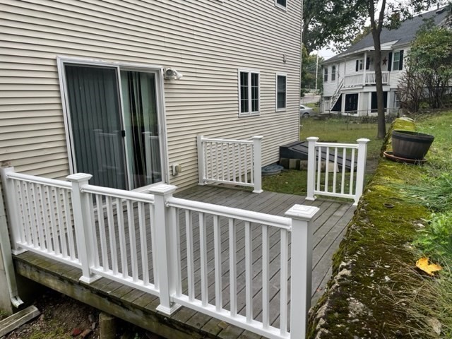 72 Cedar Road North Medford, MA 02155 - Photo 16 of 19 a view of a wooden house with a small yard