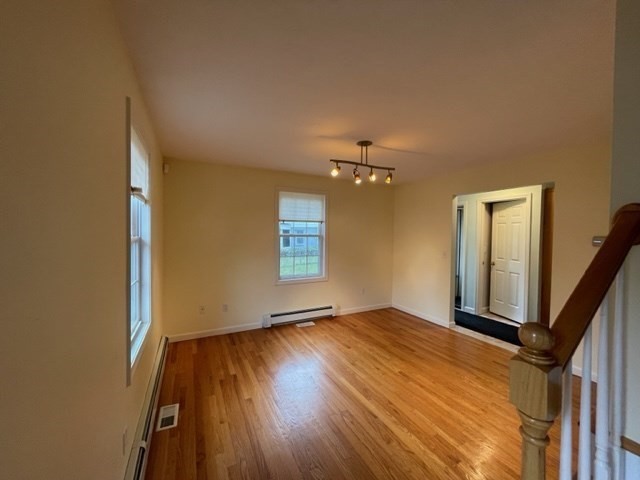 72 Cedar Road North Medford, MA 02155 - Photo 9 of 19 a view of empty room with wooden floor
