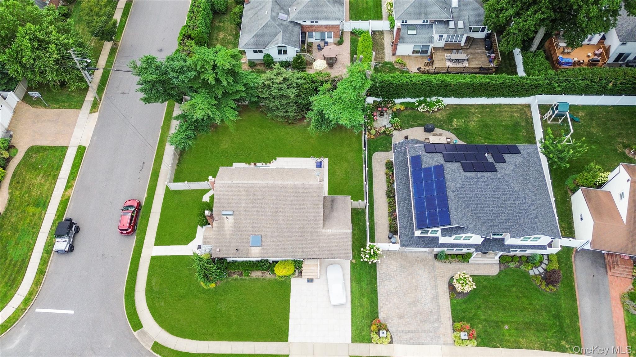 33 Shelter Hill Road Plainview, NY 11803 - Photo 31 of 34 Aerial perspective of suburban area