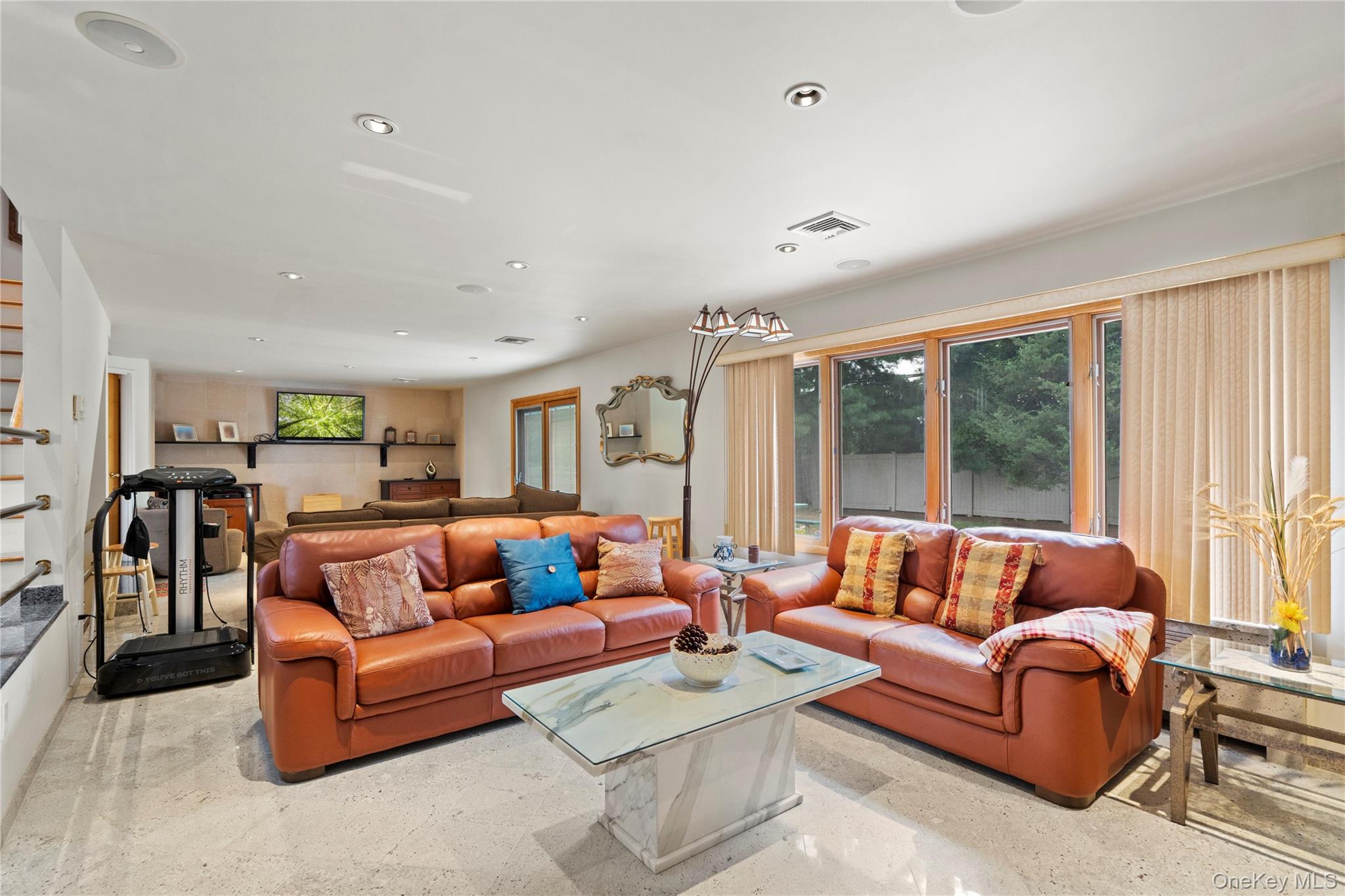 33 Shelter Hill Road Plainview, NY 11803 - Photo 9 of 34 Living Room with recessed lighting and speckled floor