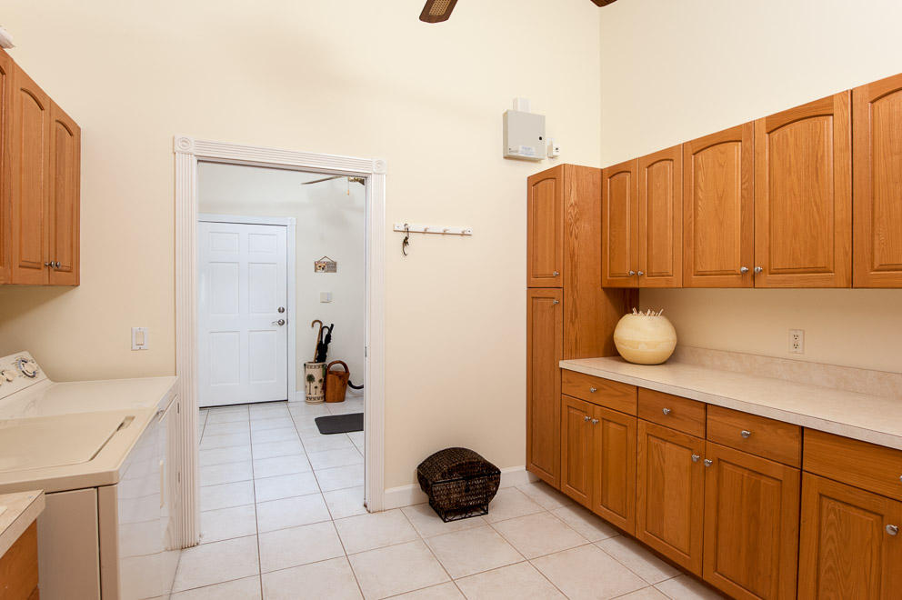 18690 Southeast River Ridge Road Tequesta, FL 33469 - Photo 15 of 17 Laundry Room