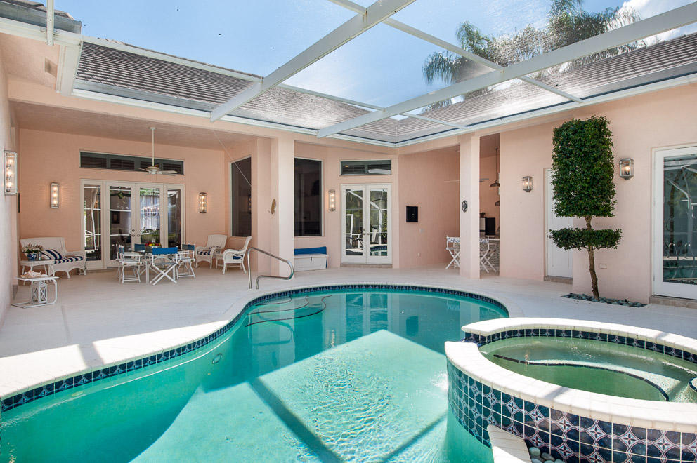 18690 Southeast River Ridge Road Tequesta, FL 33469 - Photo 8 of 17 Pool and patio area