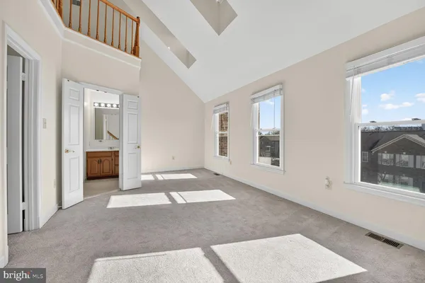 a view of an empty walk in closet