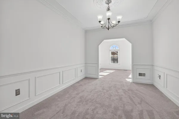 a view of a kitchen with cabinet and staircase