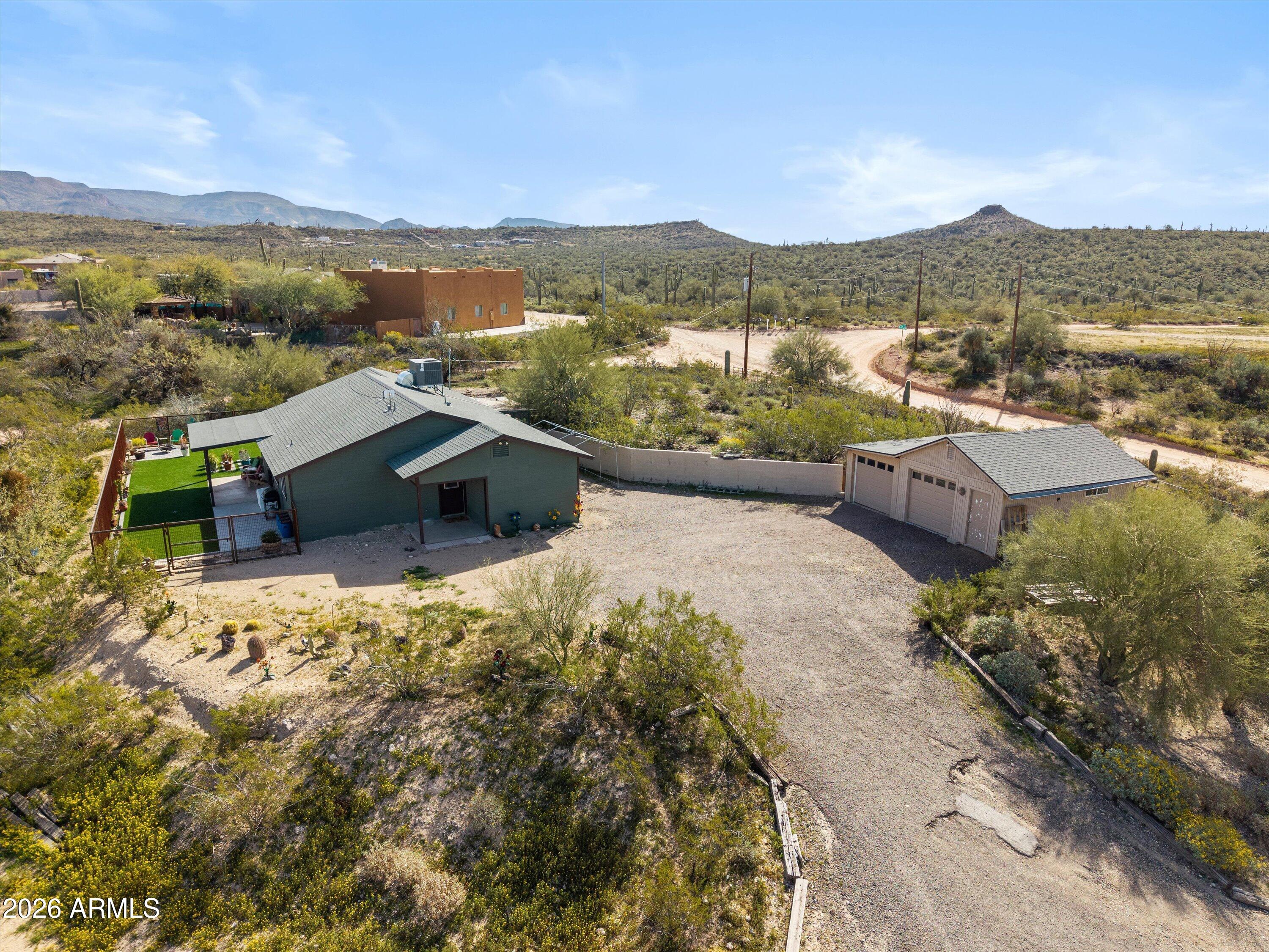 2316 West White Spar Road New River, AZ 85087 - Photo 27 of 40 a view of a terrace with a lake