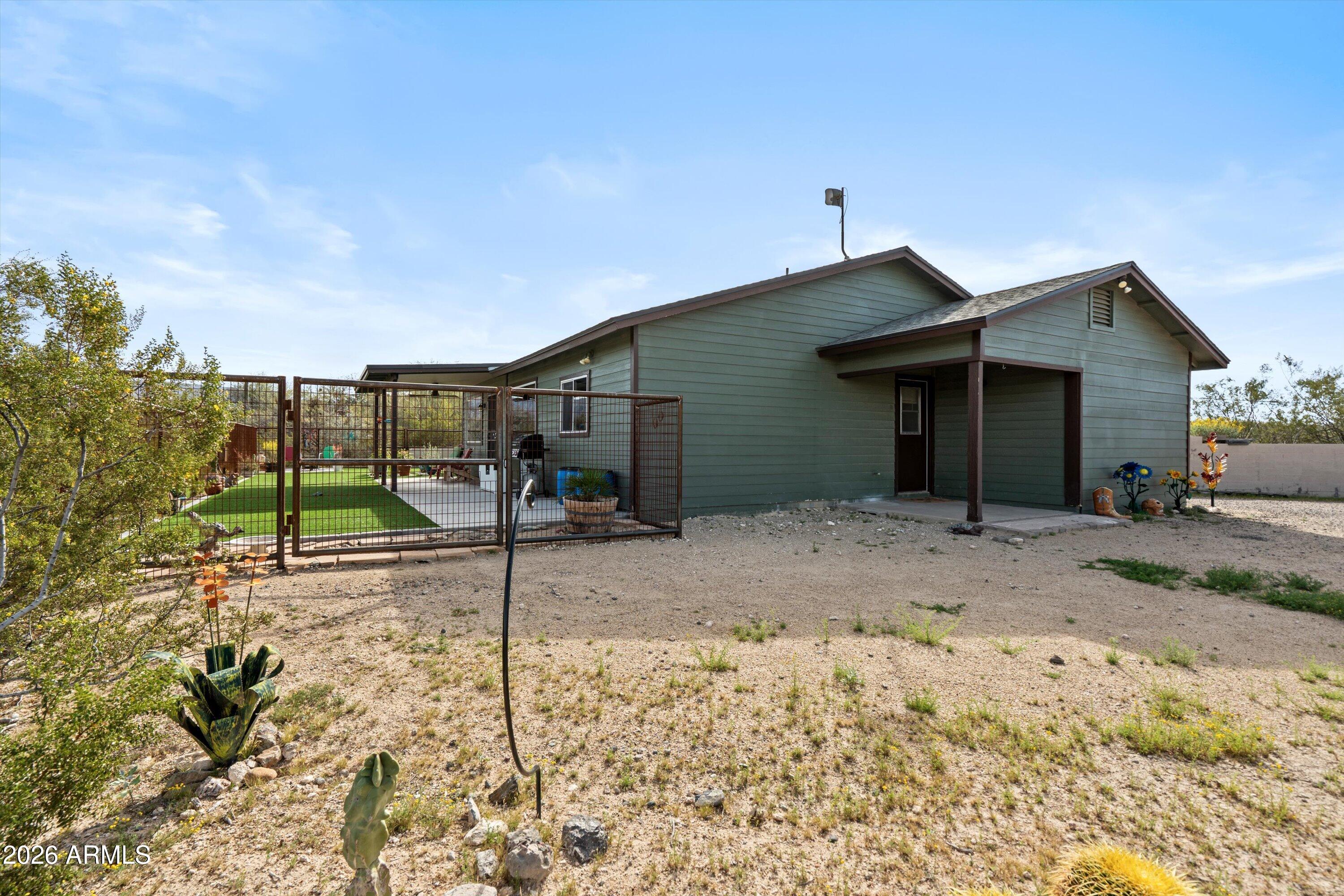 2316 West White Spar Road New River, AZ 85087 - Photo 28 of 40 a view of a house with backyard