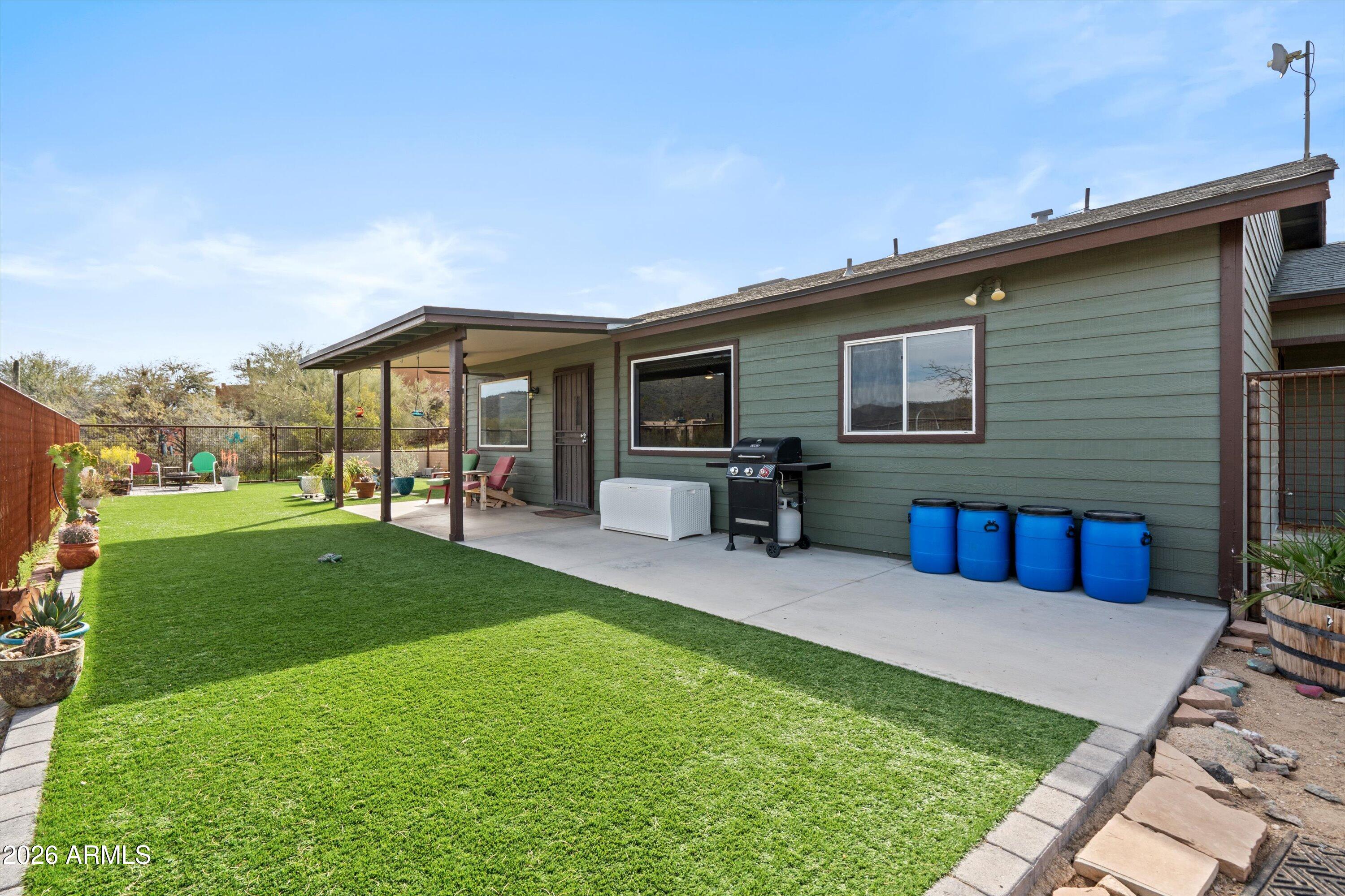 2316 West White Spar Road New River, AZ 85087 - Photo 2 of 40 a view of a house with a backyard
