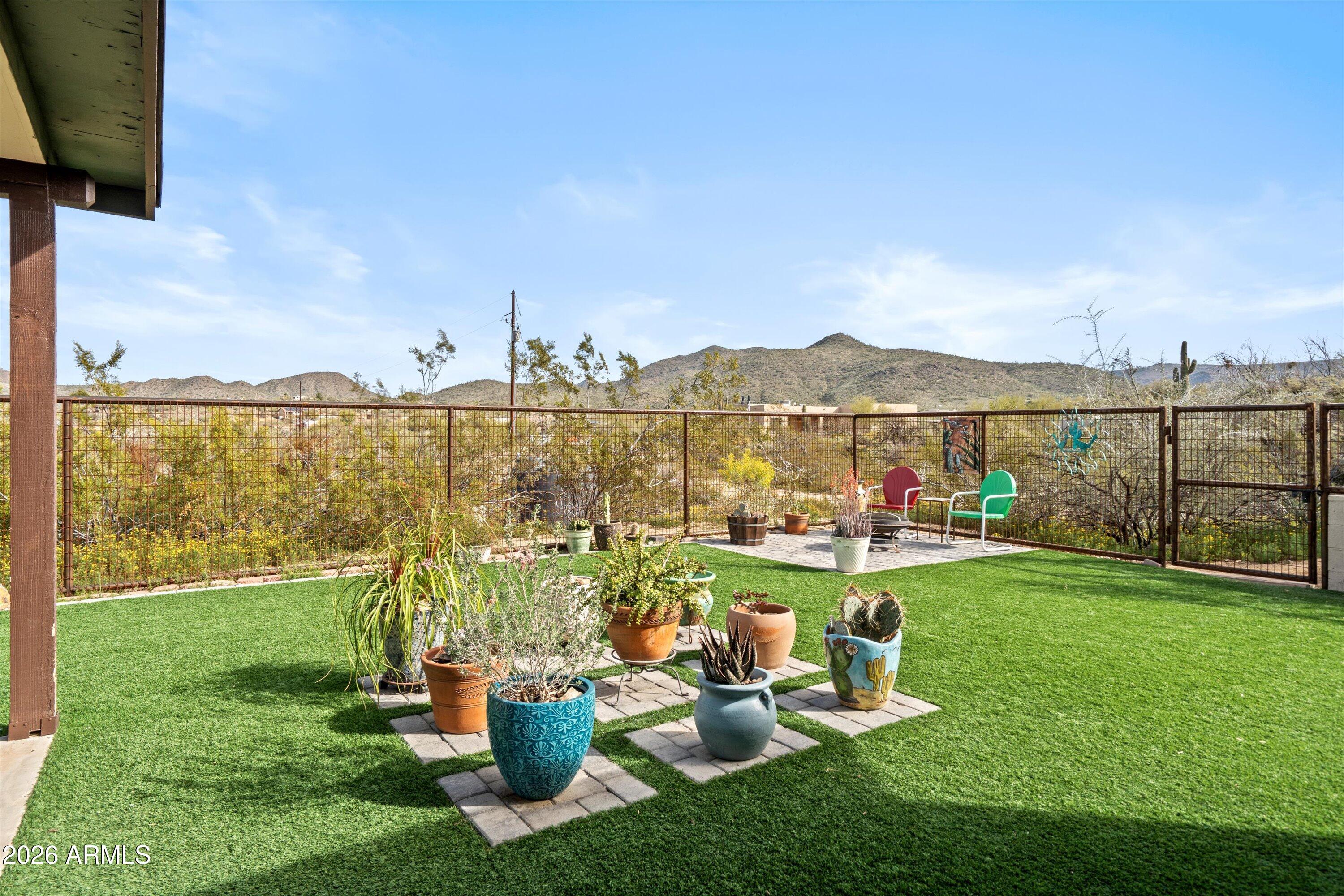 2316 West White Spar Road New River, AZ 85087 - Photo 4 of 40 a view of a garden with houses