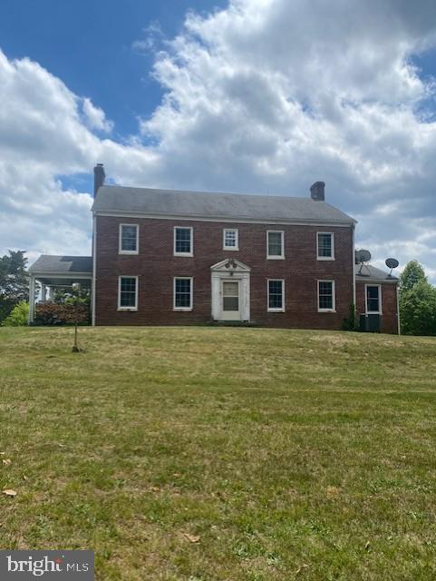 10201 Wallers Road Partlow, VA 22534 - Photo 2 of 12 a house view with a garden