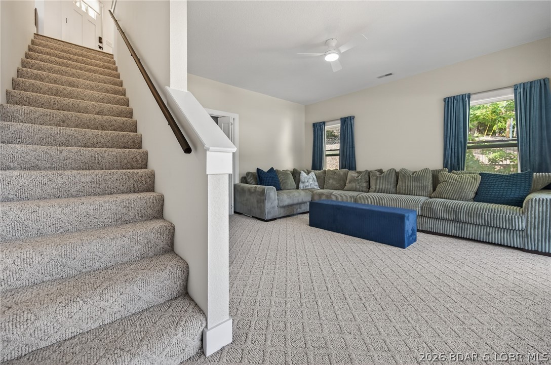 25 Old Sassafrass Road Eldon, MO 65026 - Photo 30 of 58 Stairs and lower level family room with easy care