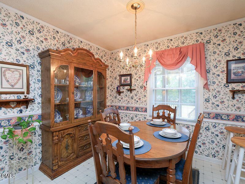524 Marshburn Road Wendell, NC 27591 - Photo 9 of 46 a view of a dining room with furniture