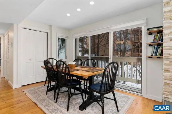 a kitchen with a white cabinets and white appliances