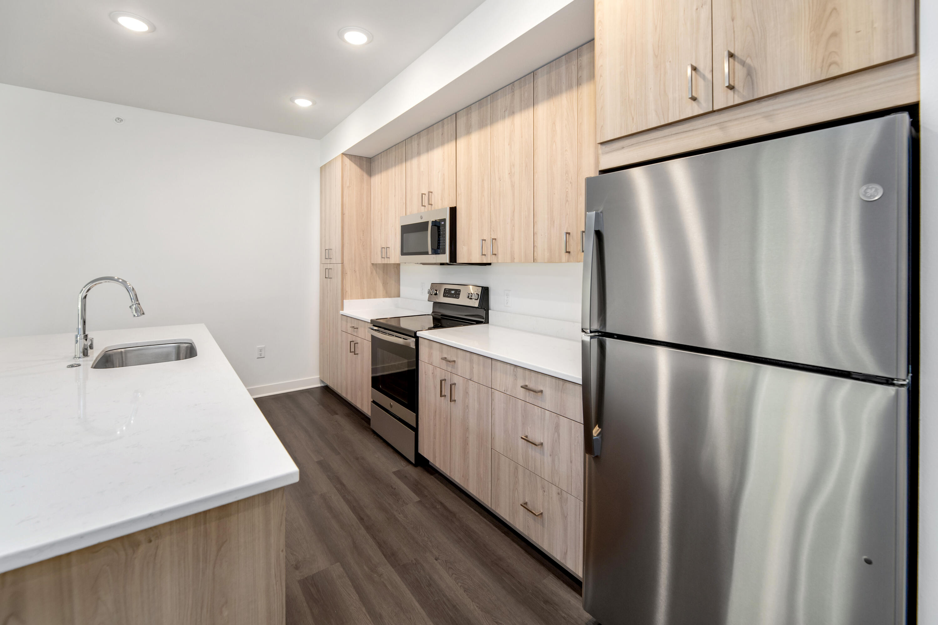 1811 West Wysteria Lane, Unit 605 Oak Creek, WI 53154 - Photo 8 of 33 High-end wood cabinetry with soft-close drawers and doors
