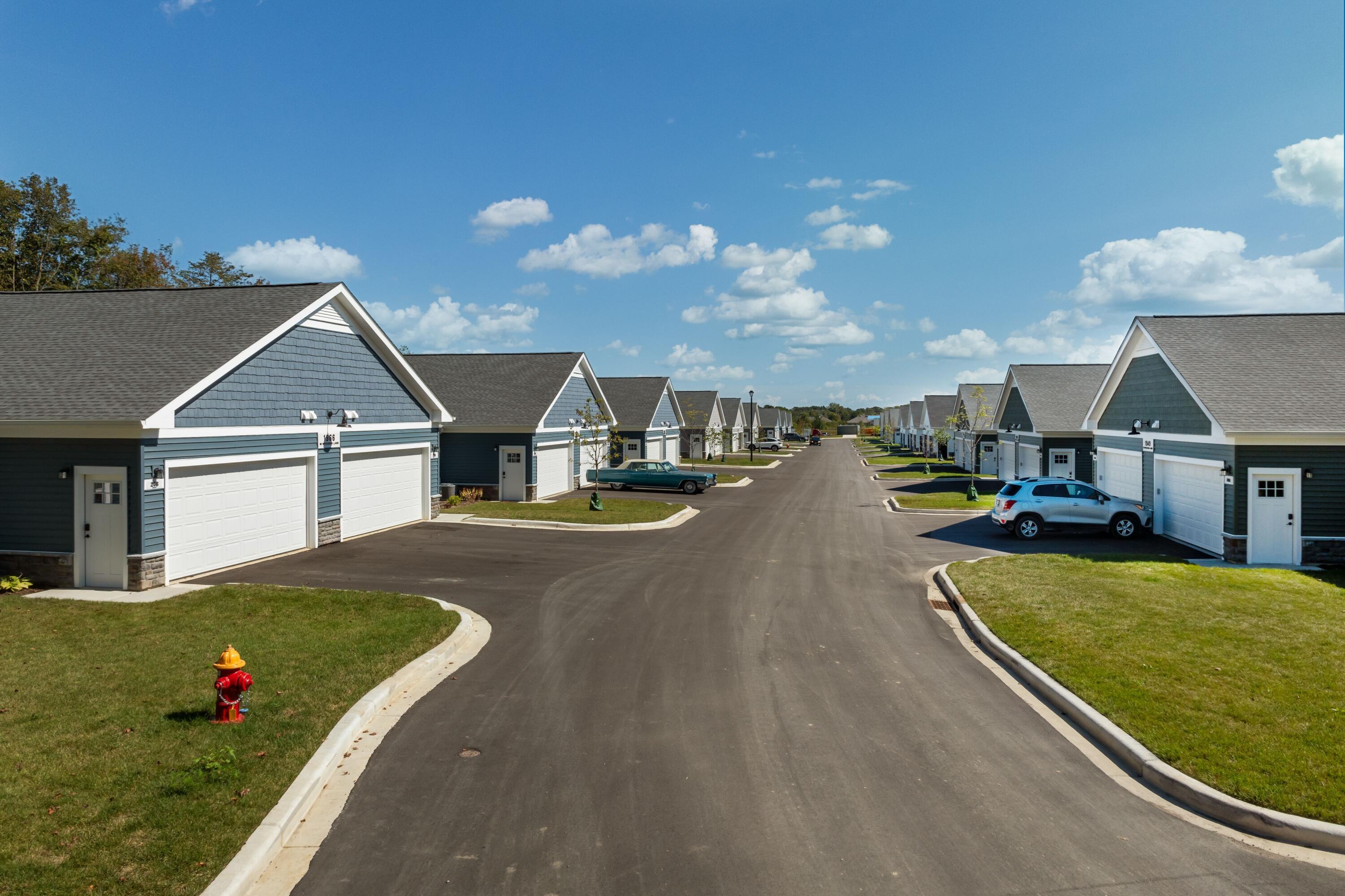 1811 West Wysteria Lane, Unit 605 Oak Creek, WI 53154 - Photo 2 of 33 Exterior photos are representative of the various ranch-style apartment buildings within the community and may not depict the exact unit listed.