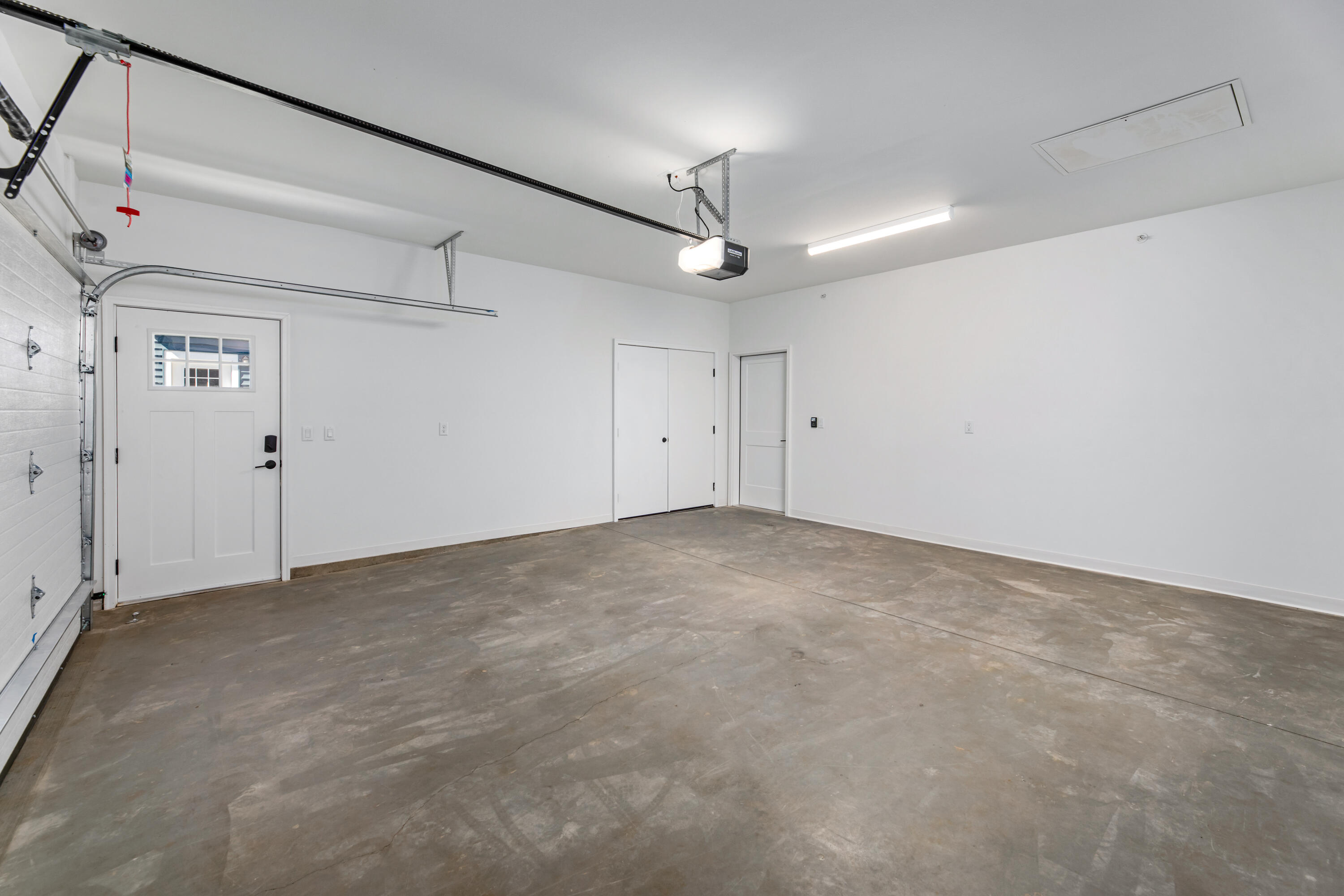 1811 West Wysteria Lane, Unit 605 Oak Creek, WI 53154 - Photo 18 of 33 High-speed electric vehicle charging in garage