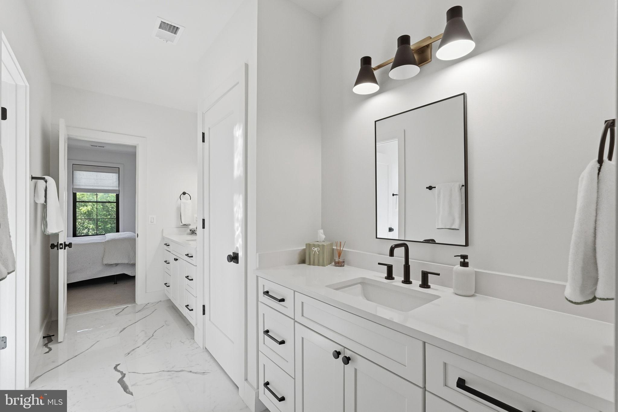6026 Little Falls Road Arlington, VA 22207 - Photo 22 of 44 Jack and Jill bathroom with separate vanities