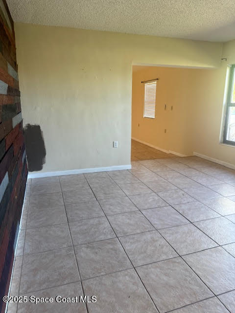 119 Explorer Street Cocoa, FL 32922 - Photo 2 of 19 a view of an empty room and window
