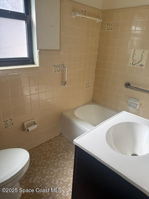 119 Explorer Street Cocoa, FL 32922 - Photo 10 of 19 a bathroom with a sink a toilet and shower