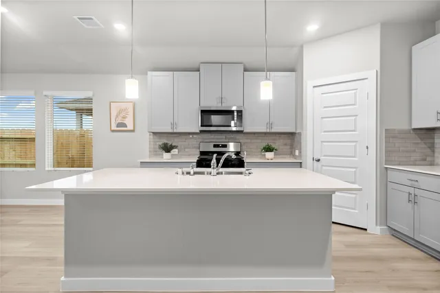 a bed room with a bed and a couch