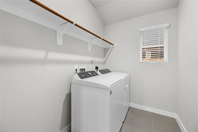 a view of a yard with a house in the background