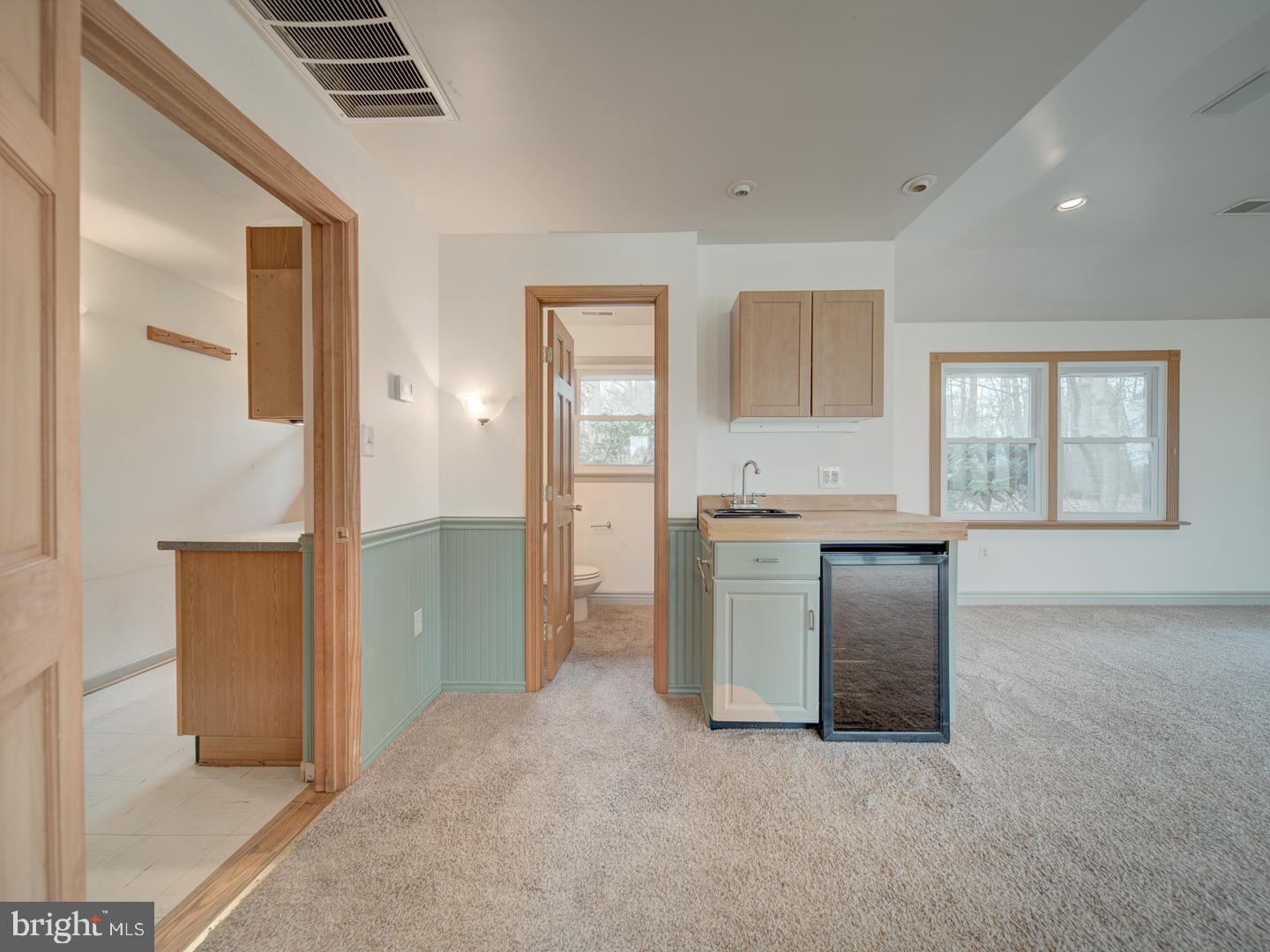17520 Tranquility Road Purcellville, VA 20132 - Photo 49 of 70 a view of kitchen with granite countertop cabinets and refrigerator