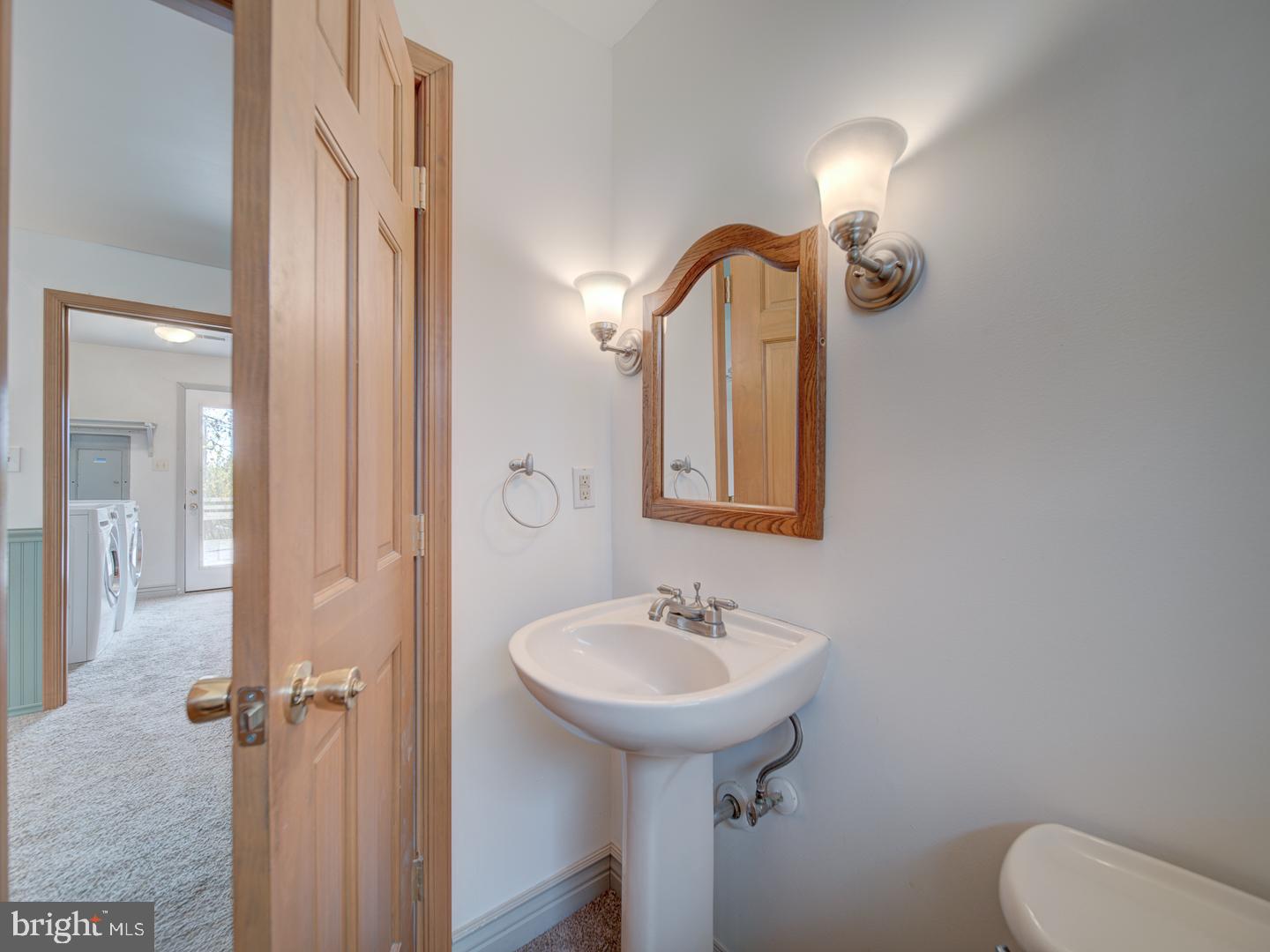 17520 Tranquility Road Purcellville, VA 20132 - Photo 50 of 70 a bathroom with a sink toilet and shower
