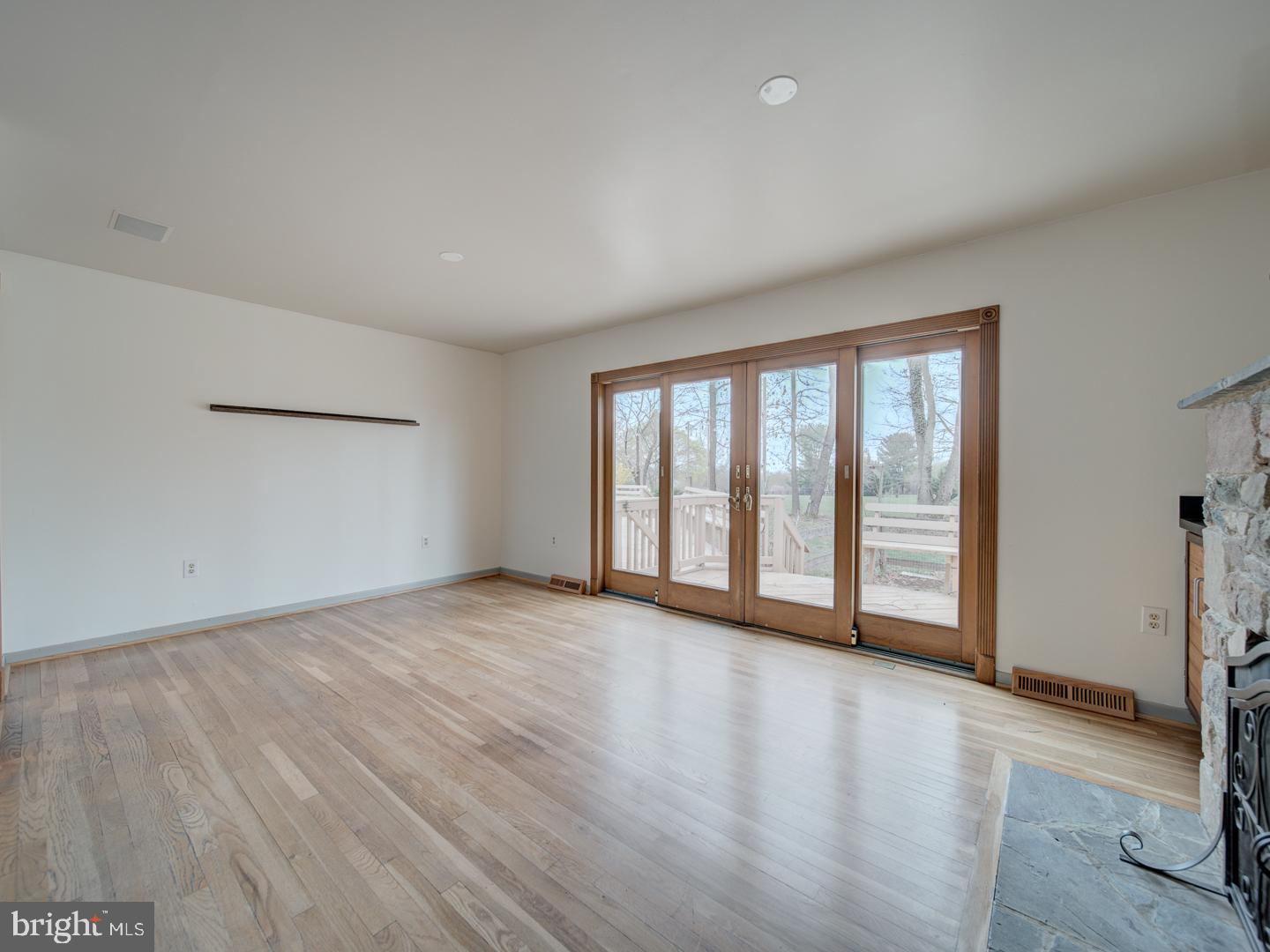 17520 Tranquility Road Purcellville, VA 20132 - Photo 10 of 70 wooden floor in an empty room with a window