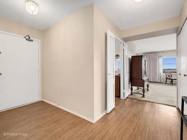 a view of a hardwood floor and a livingroom view