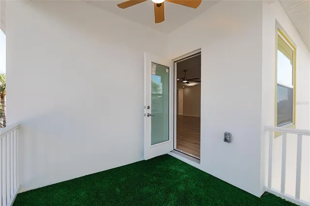 a view of an entryway of a house and a yard