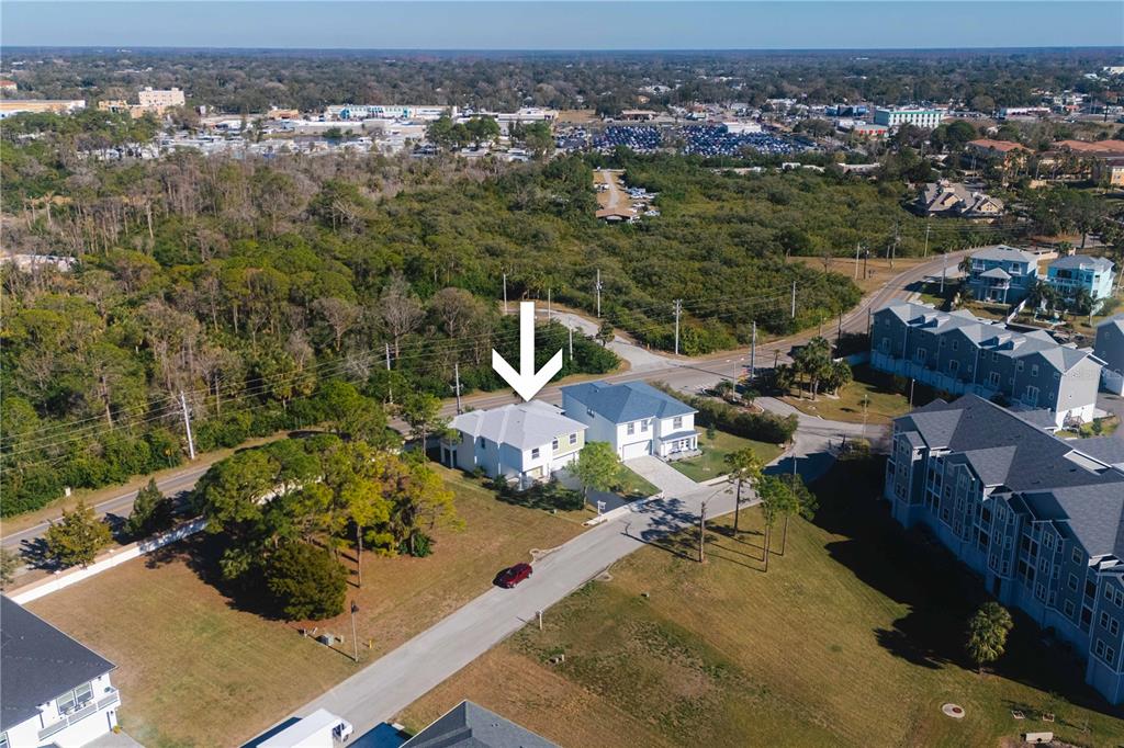 4829 Jenny Way New Port Richey, FL 34652 - Photo 25 of 30 an aerial view of a house with a yard