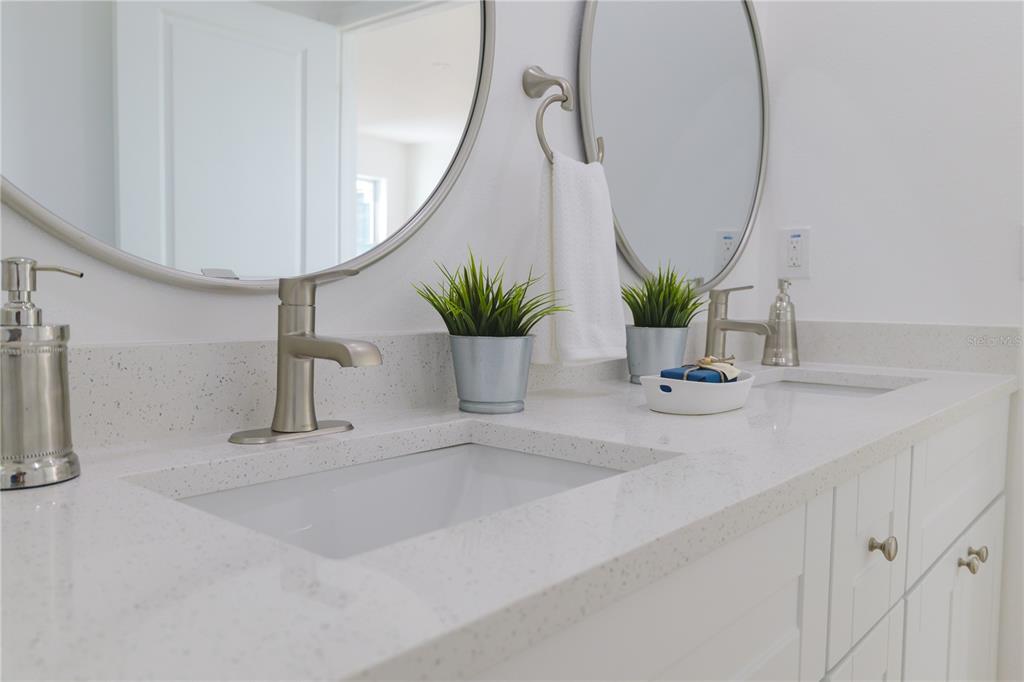 4829 Jenny Way New Port Richey, FL 34652 - Photo 10 of 30 a view of bathroom with a sink and mirror