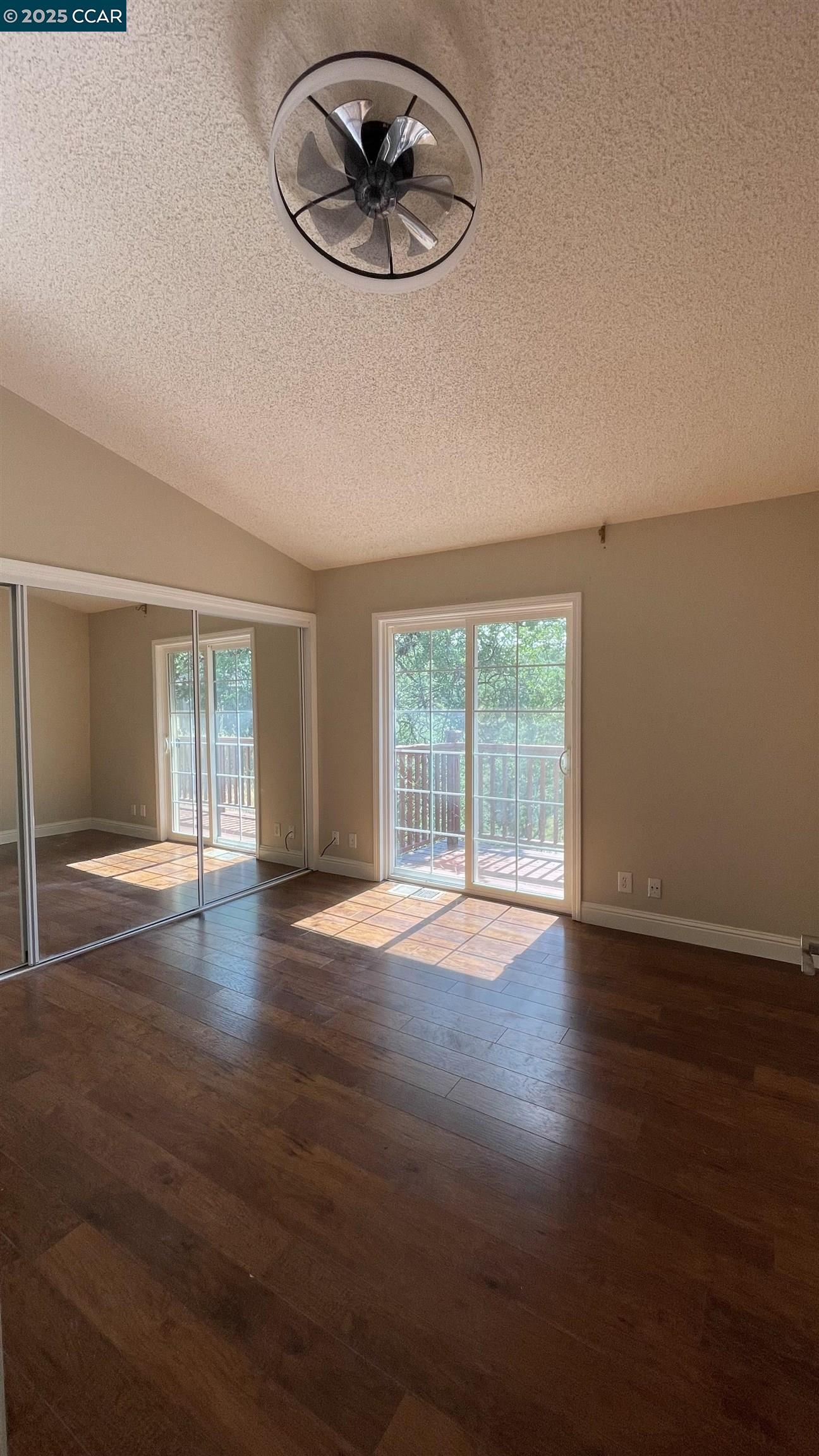 14630 St Croy Road Red Bluff, CA 96080 - Photo 11 of 29 a view of an empty room with wooden floor and a window