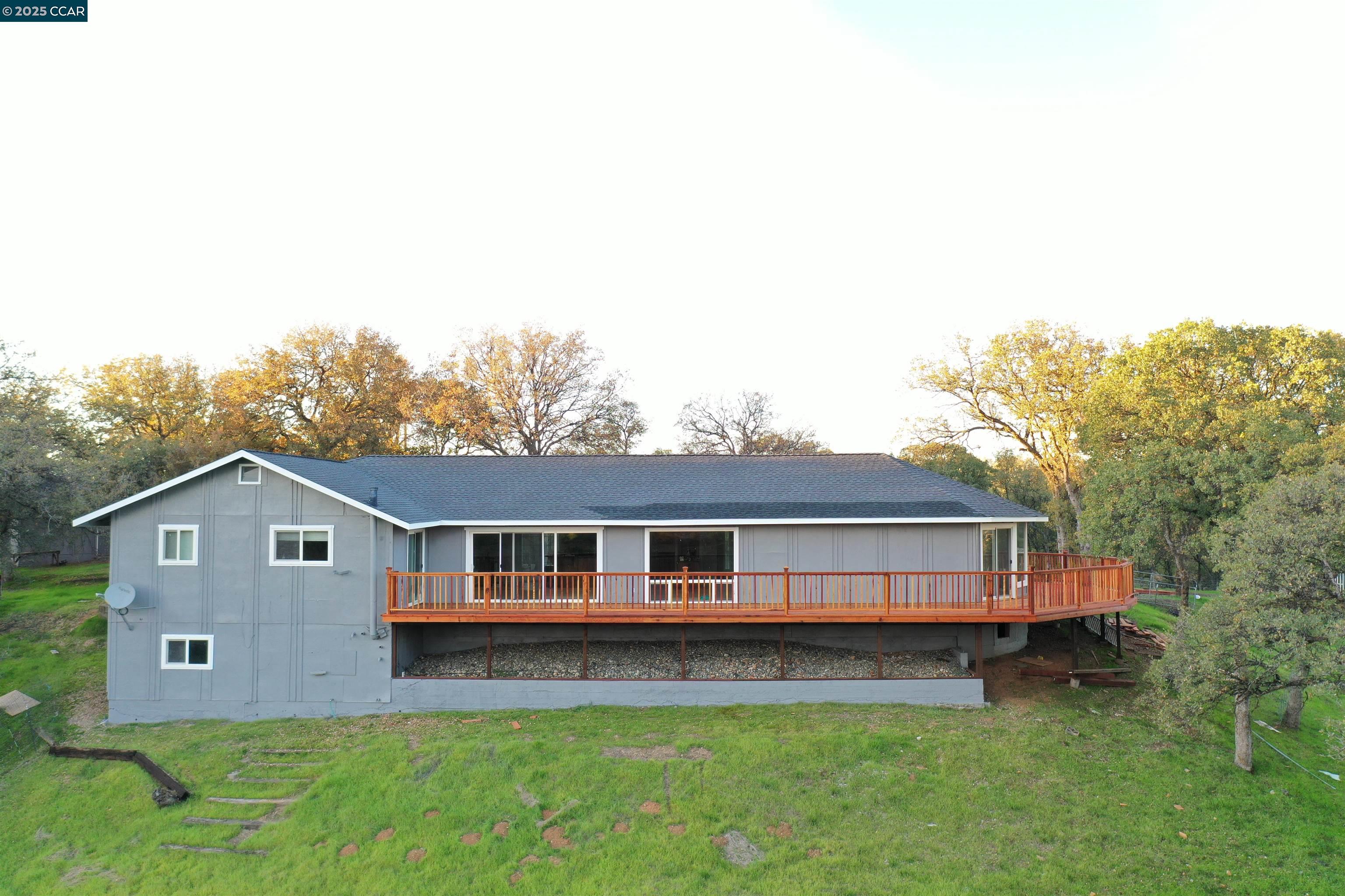 14630 St Croy Road Red Bluff, CA 96080 - Photo 18 of 29 a front view of a house with a garden