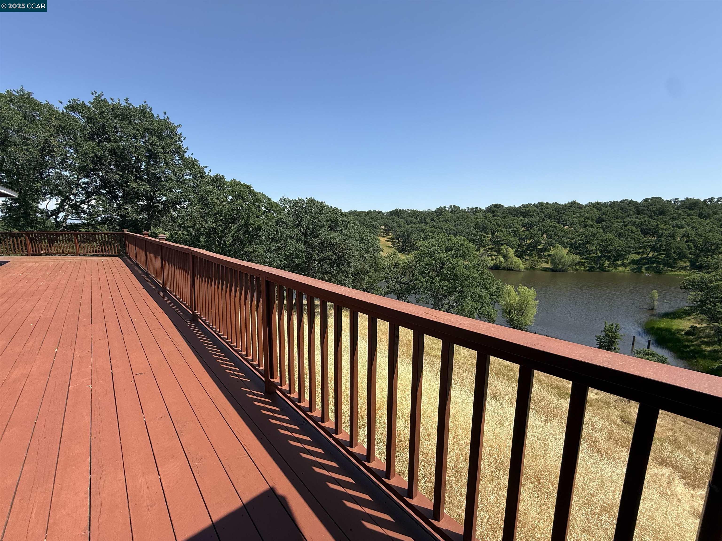14630 St Croy Road Red Bluff, CA 96080 - Photo 22 of 29 a view of balcony with wooden floor and fence