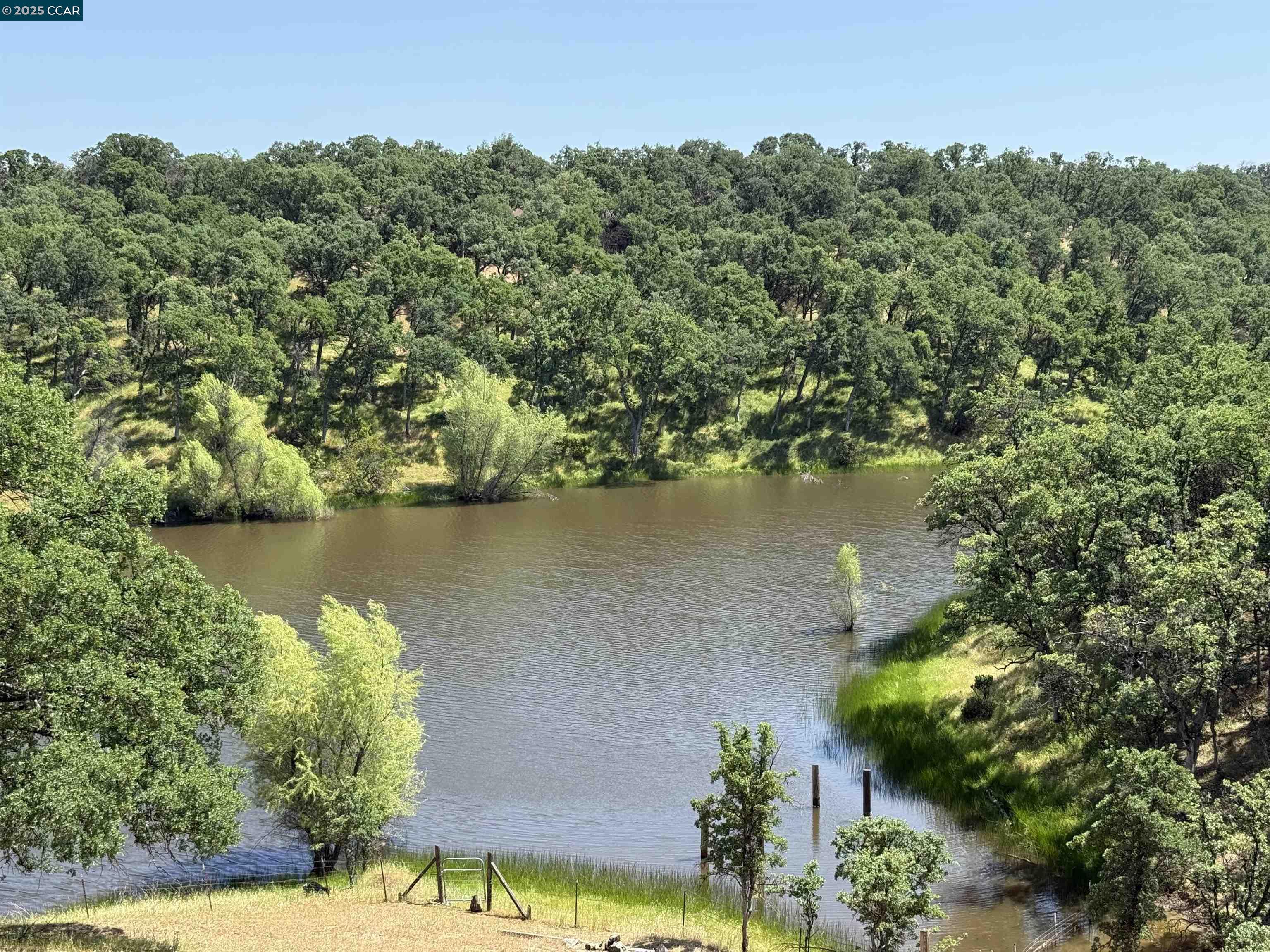 14630 St Croy Road Red Bluff, CA 96080 - Photo 23 of 29 an aerial view of a residential houses with outdoor space and lake view