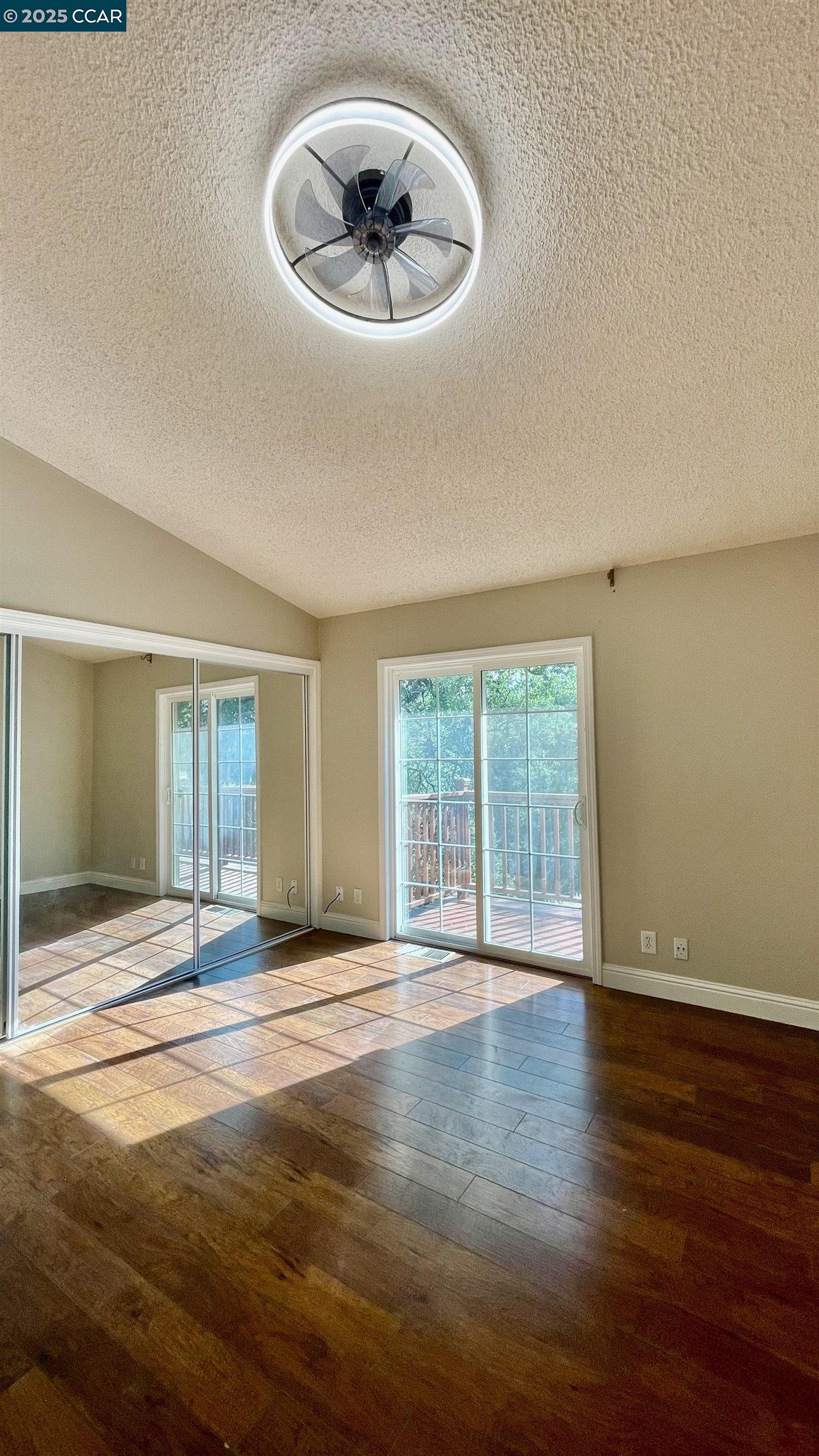 14630 St Croy Road Red Bluff, CA 96080 - Photo 8 of 29 a view of an empty room with wooden floor and a window