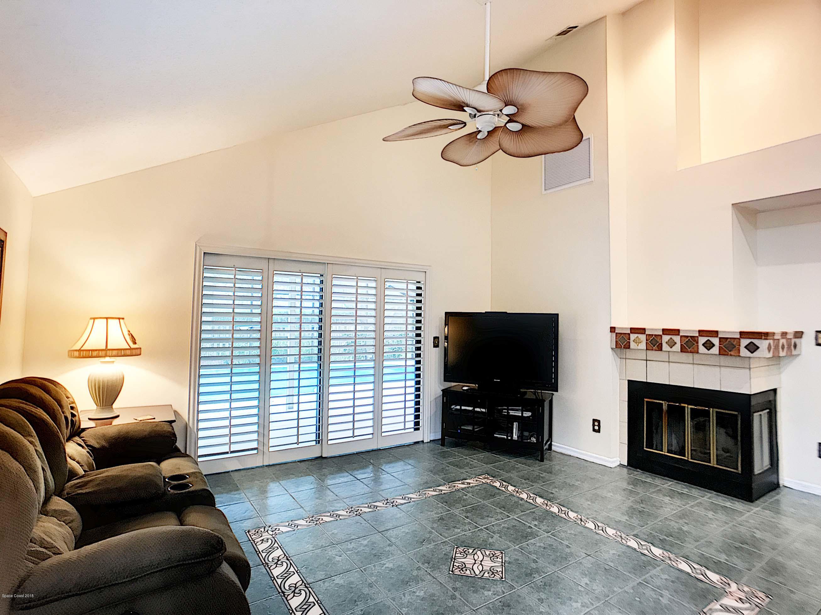 359 Lake Road Lake Mary, FL 32746 - Photo 13 of 34 Family Room and Fireplace