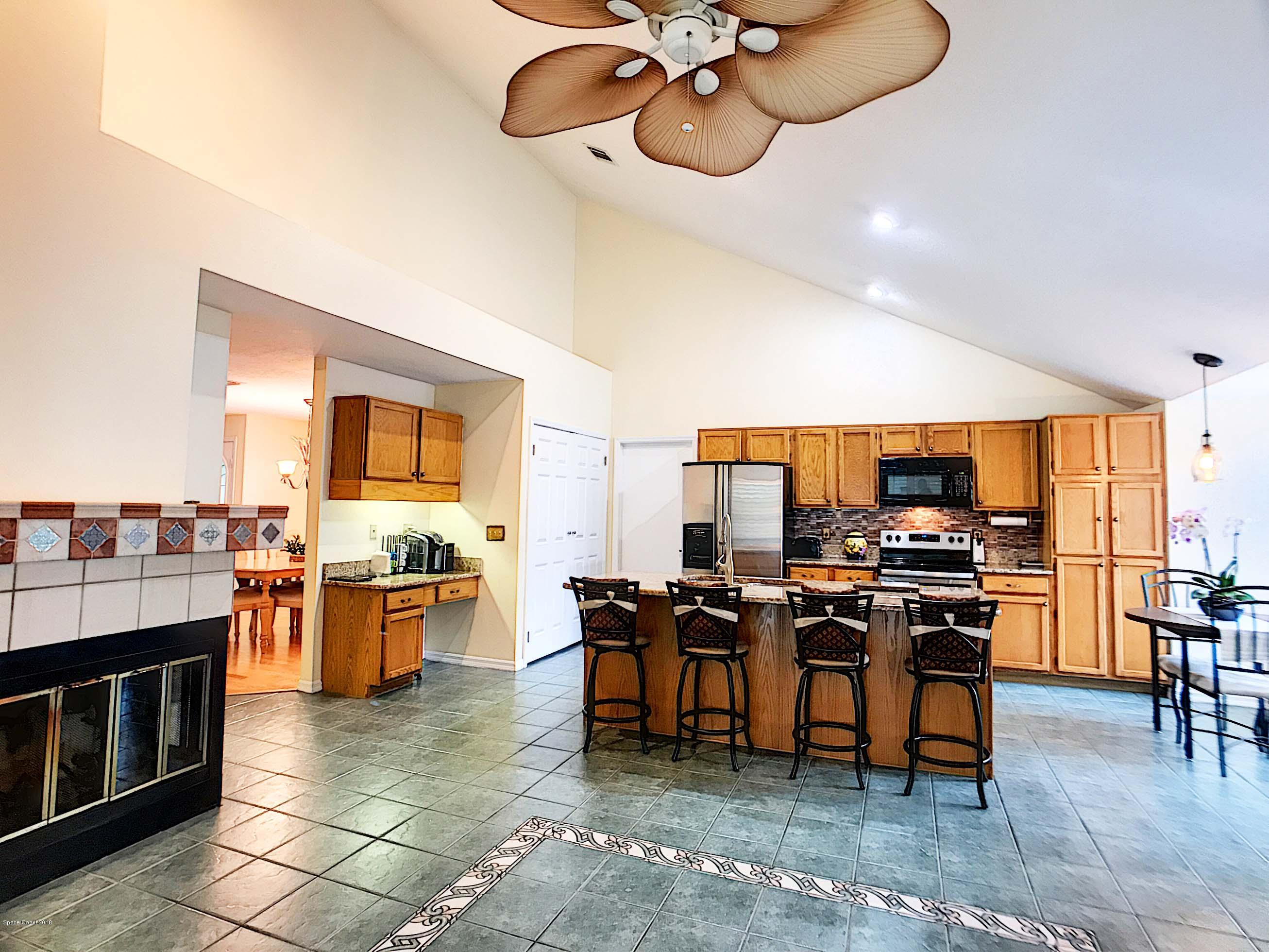 359 Lake Road Lake Mary, FL 32746 - Photo 14 of 34 Family Room to Kitchen