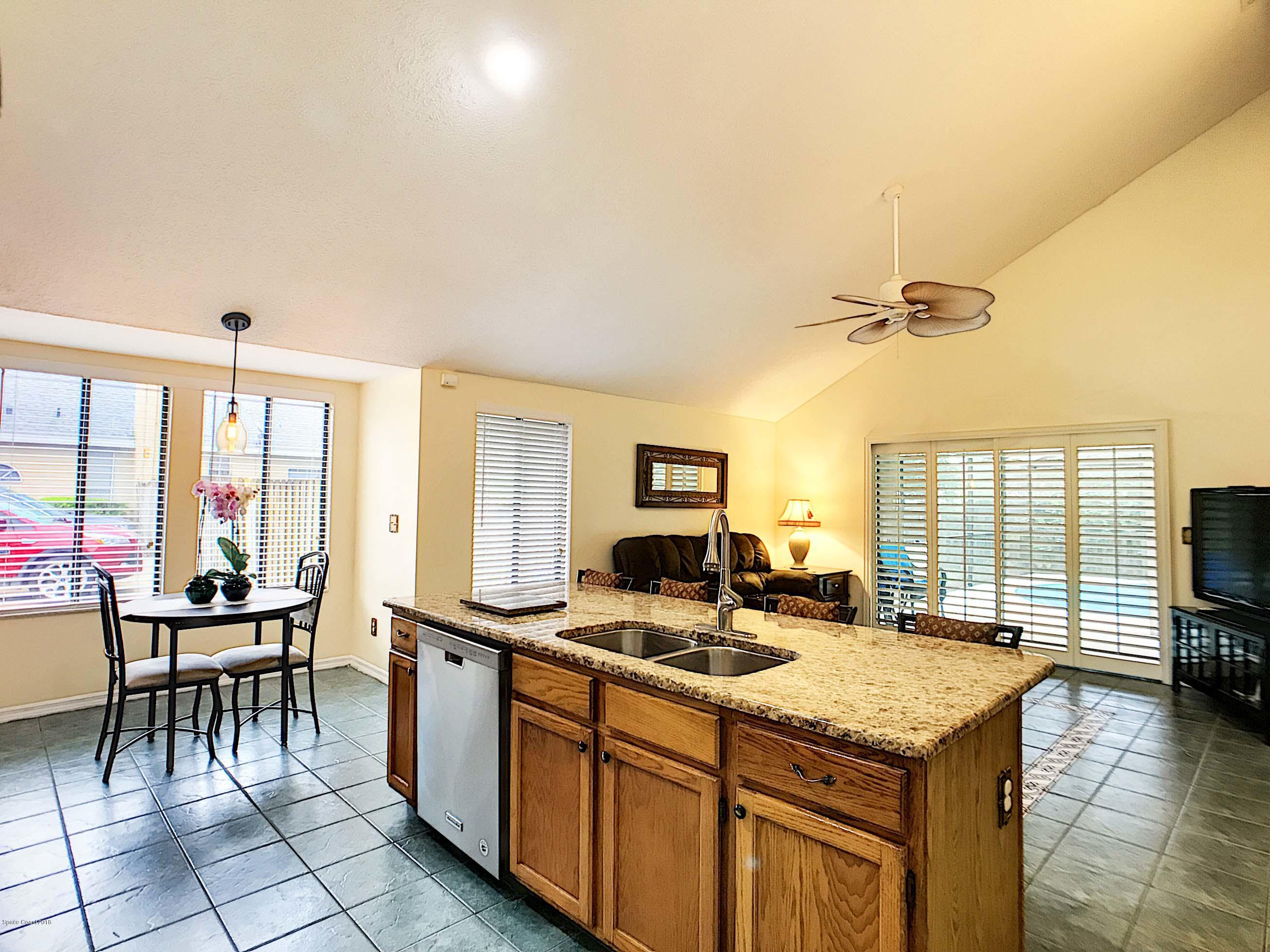 359 Lake Road Lake Mary, FL 32746 - Photo 17 of 34 Kitchen to Family Room