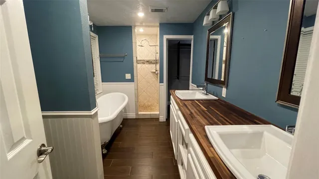 a close view of a utility room with dryer and washer