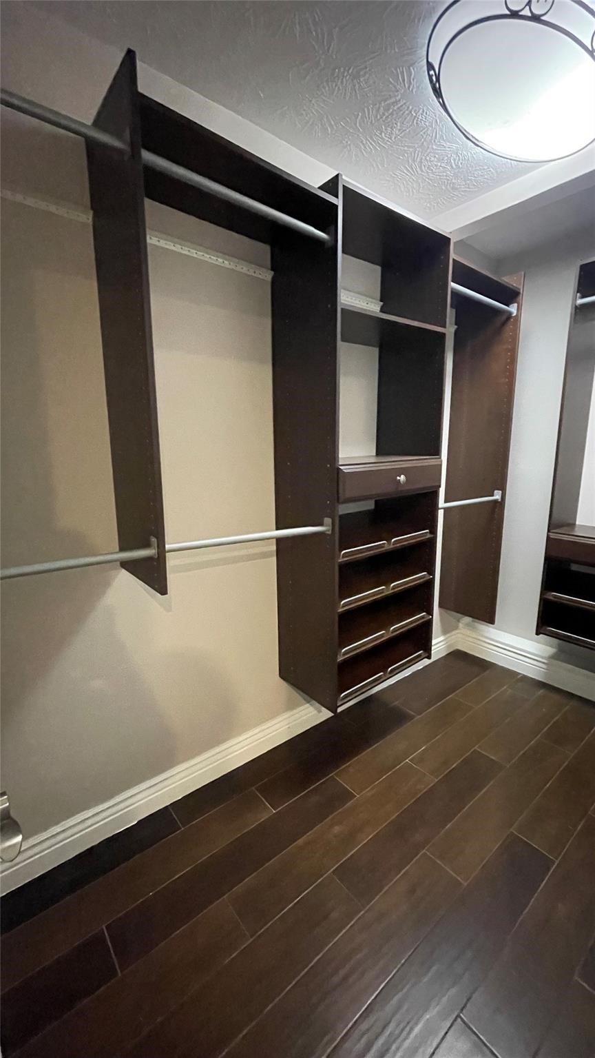3500 Barbers Hill Road Highlands, TX 77562 - Photo 18 of 22 a view of walk in closet with empty racks