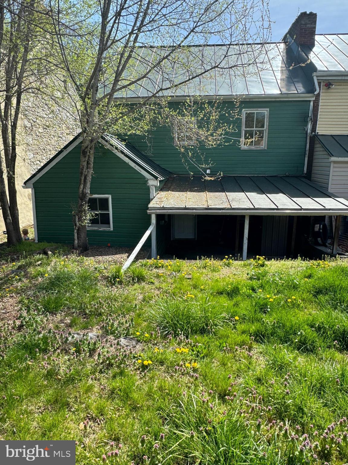 413 South Braddock Street Winchester, VA 22601 - Photo 20 of 20 a view of a house with a yard