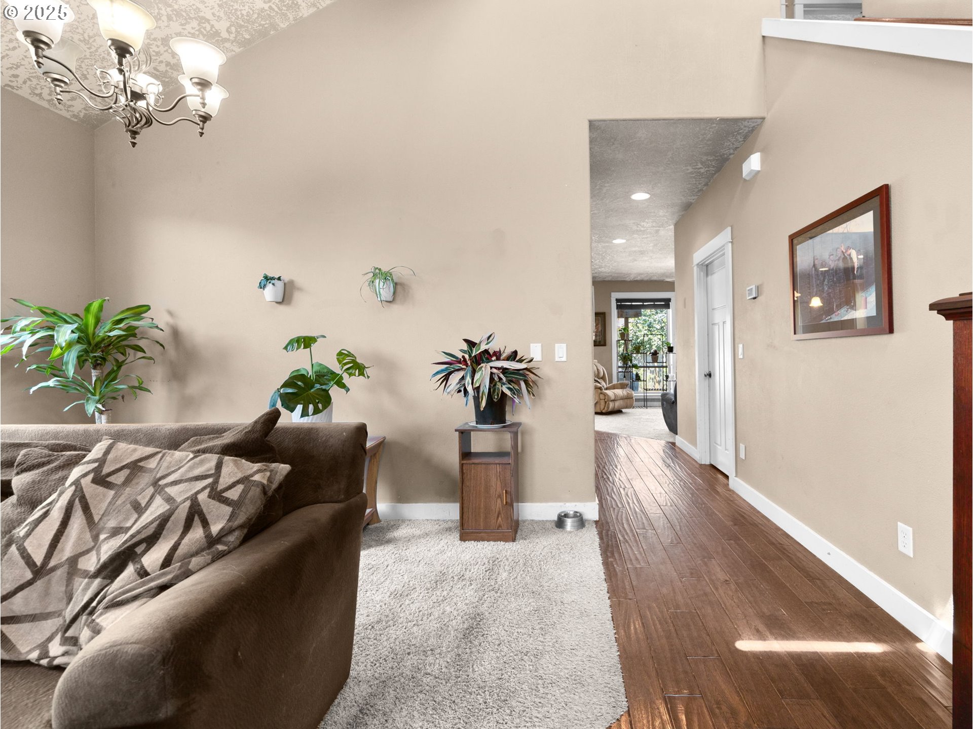 18653 Van Fleet Avenue Sandy, OR 97055 - Photo 12 of 48 a living room with furniture flowerpot and wooden floor