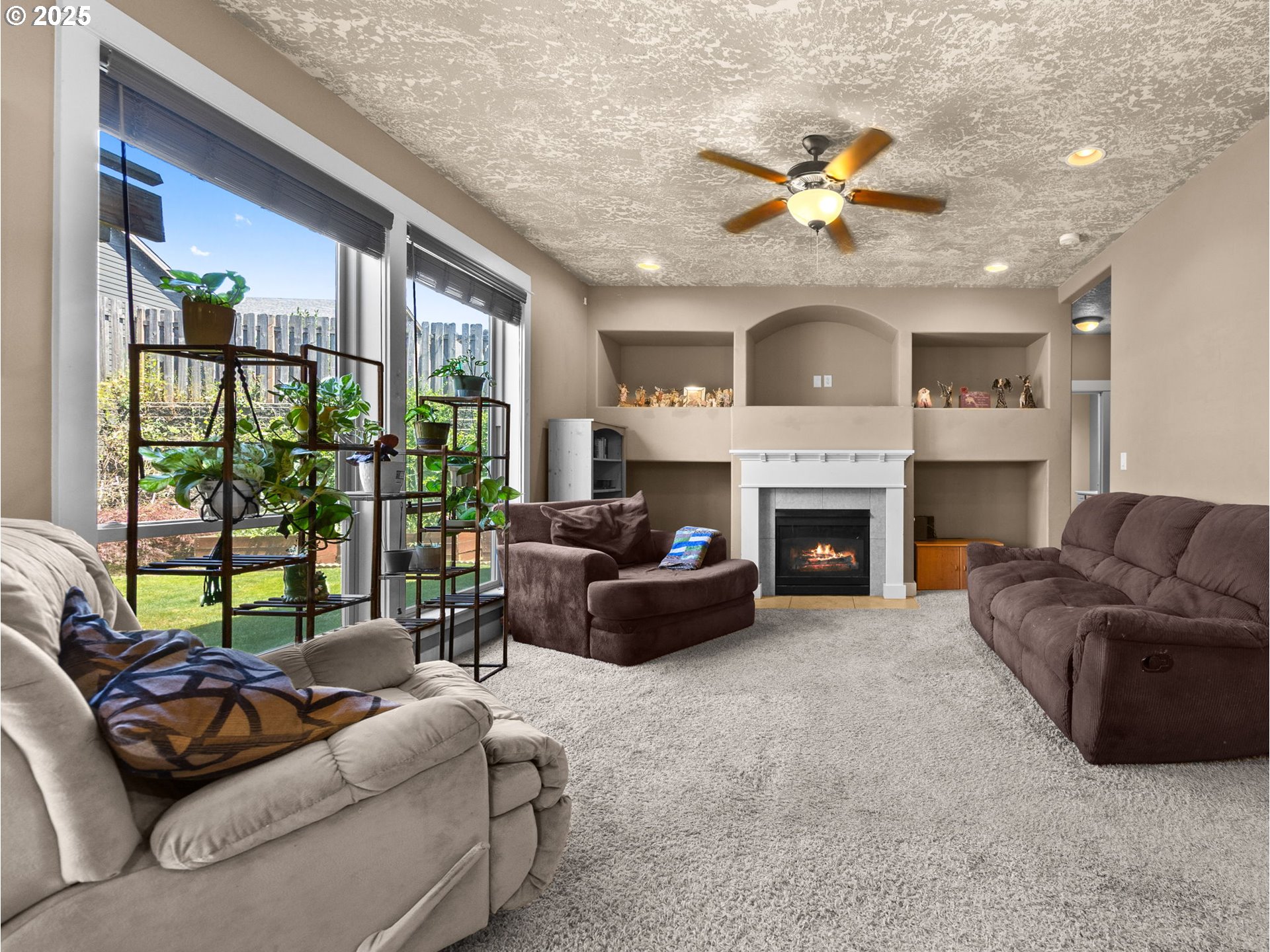 18653 Van Fleet Avenue Sandy, OR 97055 - Photo 22 of 48 a living room with furniture and a fireplace