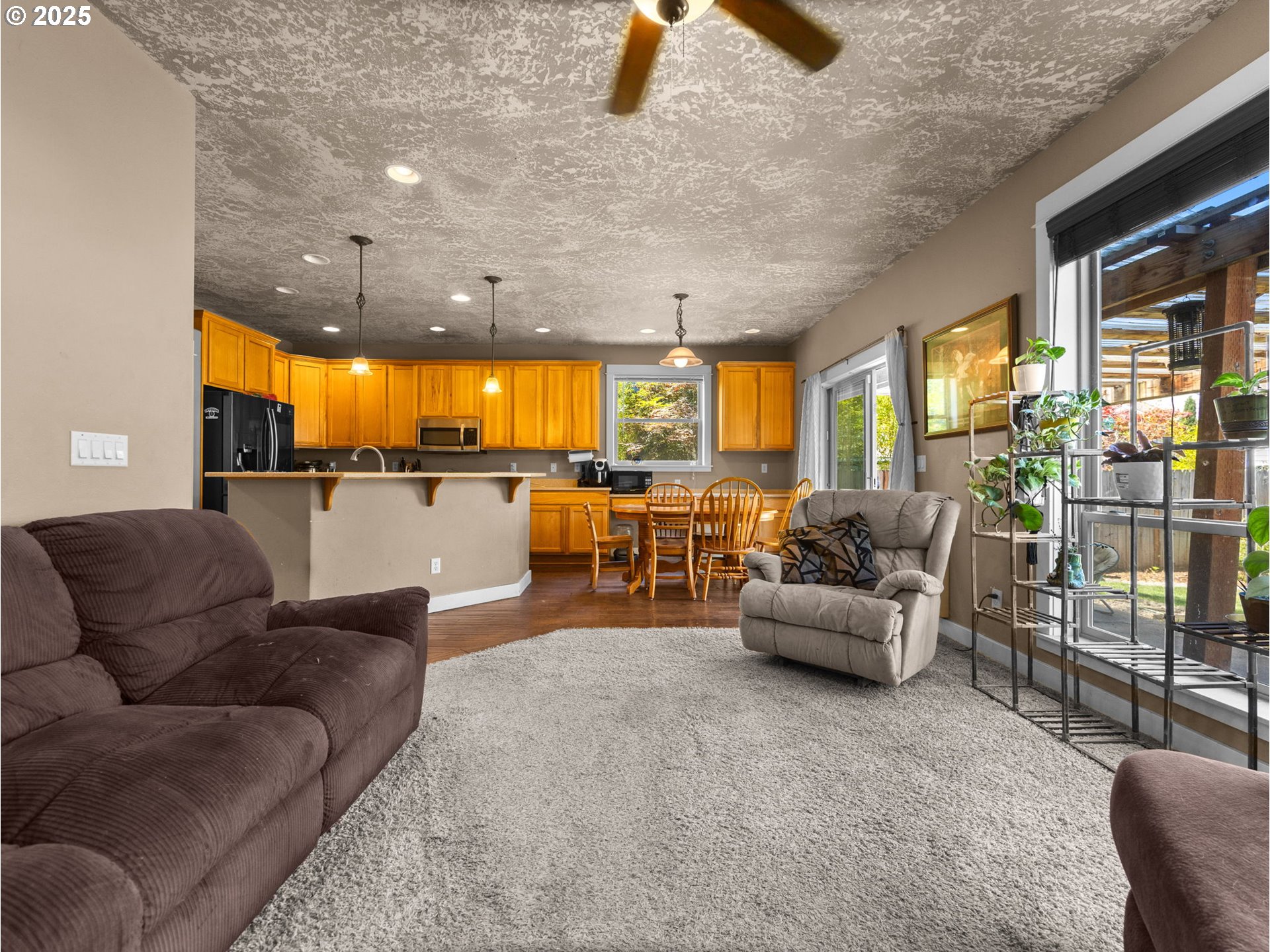 18653 Van Fleet Avenue Sandy, OR 97055 - Photo 23 of 48 a living room with furniture and a large window