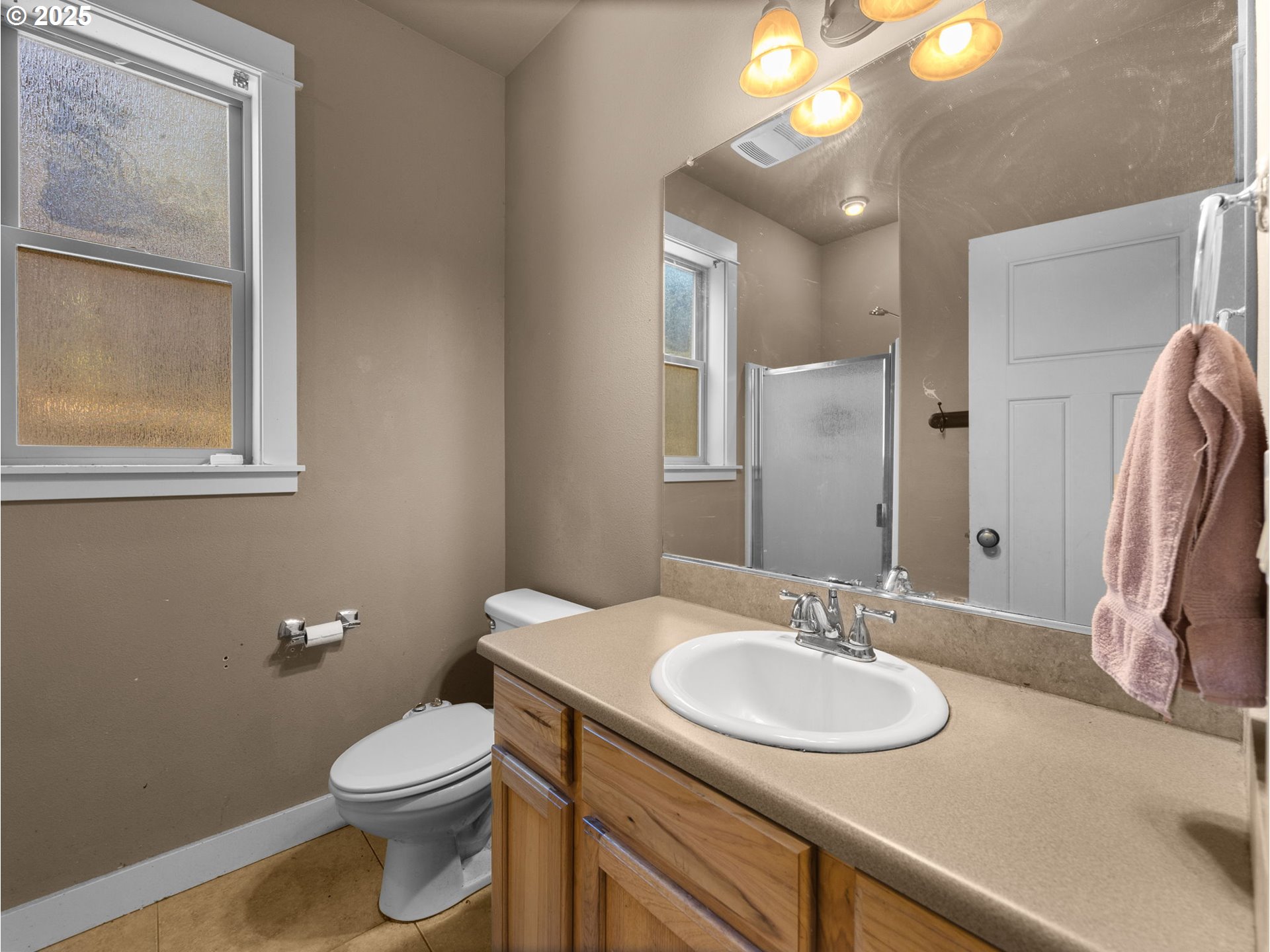 18653 Van Fleet Avenue Sandy, OR 97055 - Photo 27 of 48 a bathroom with a sink and a mirror