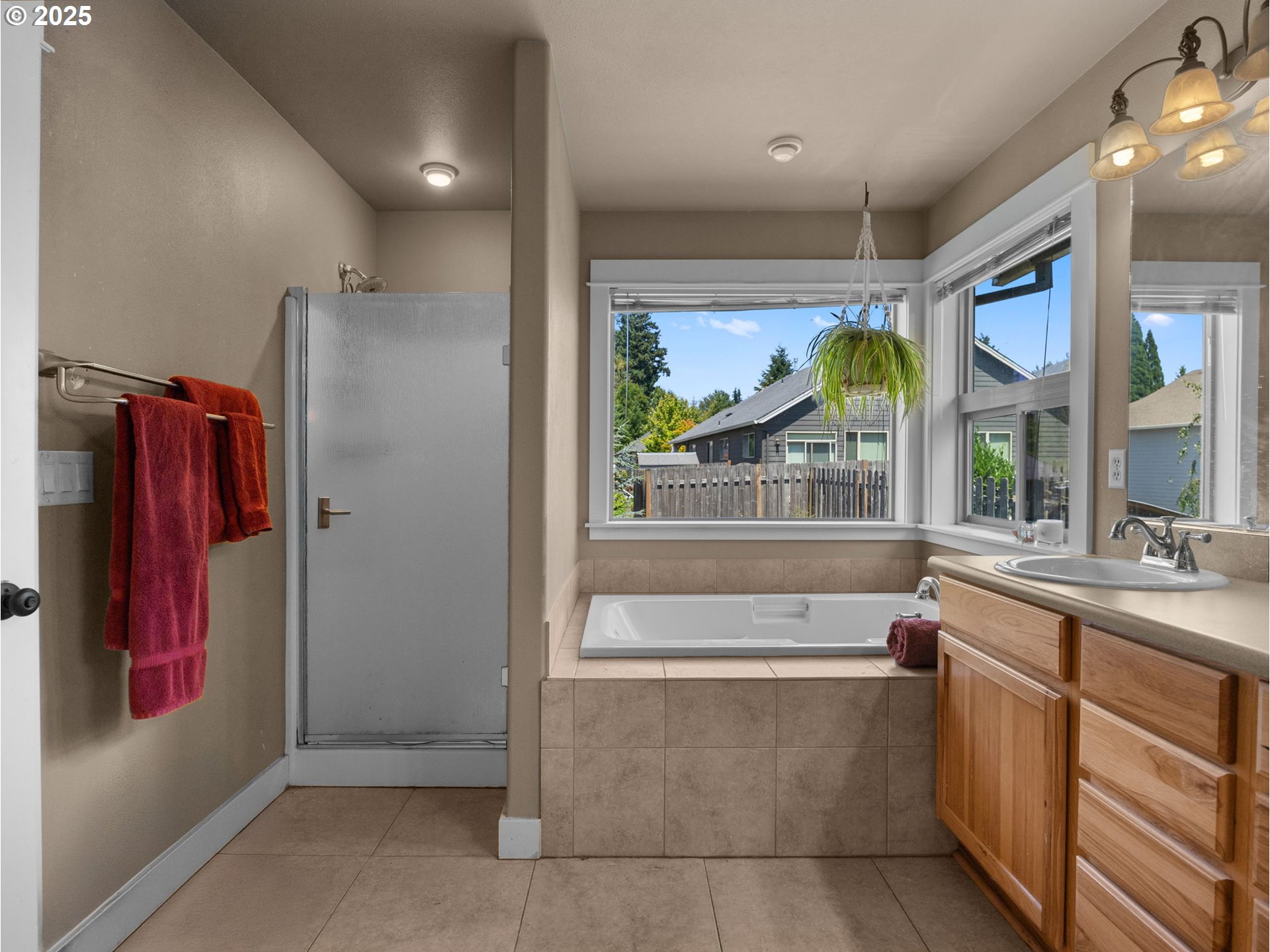 18653 Van Fleet Avenue Sandy, OR 97055 - Photo 35 of 48 a bathroom with a tub sink and mirror
